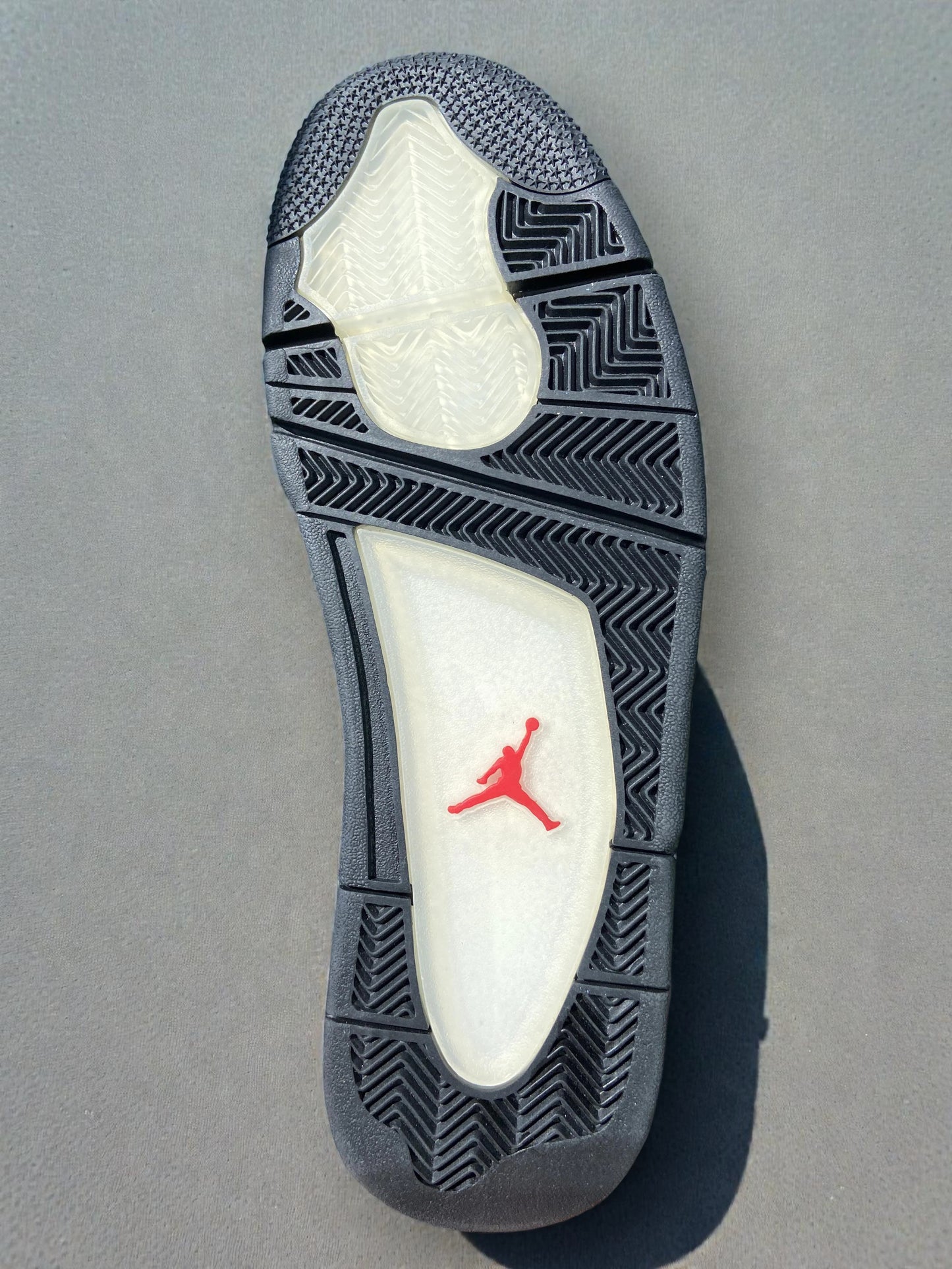 Jordan 4 Travis Scott